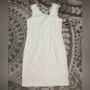 Spence Dress Woman’s Sz. 10 Sleeveless Ivory Color asymmetrical neckline